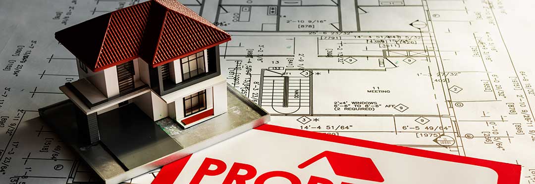 A house on top of architectural plans. One of legal separation's effects is that the spouses can live apart and have no martial obligations to each other.