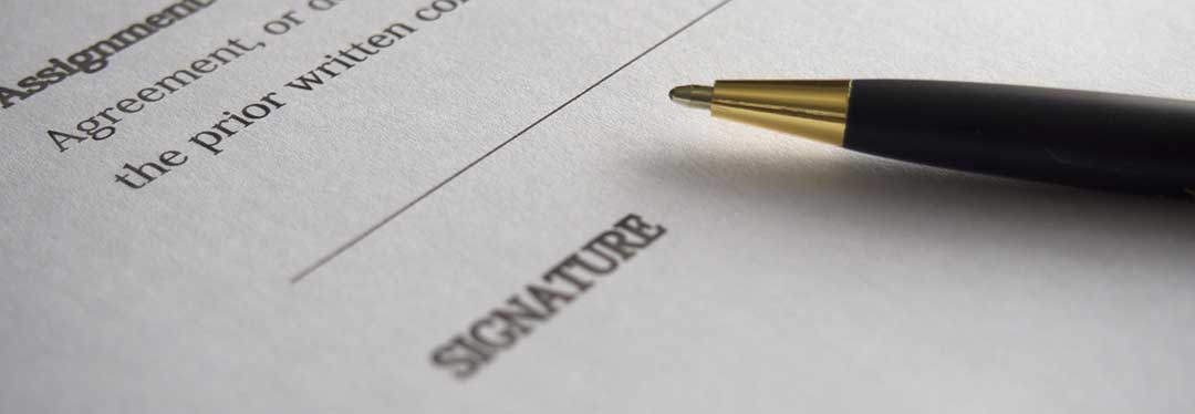 A pen at the signature line. A sample mortgage contract can be found here.