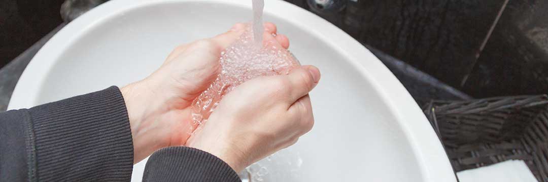 Washing hands to indicate the doctrine of clean hands.