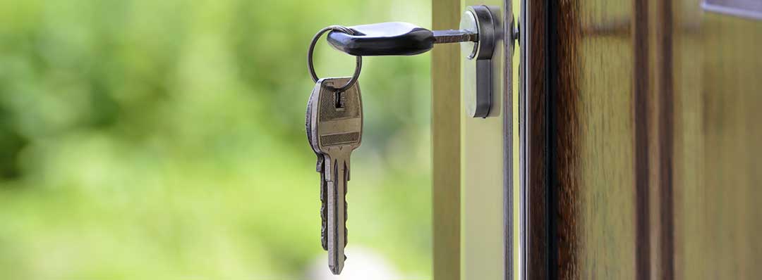 Key in an unlocked door to denote rental, which is considered interest in an unwritten mortgage.