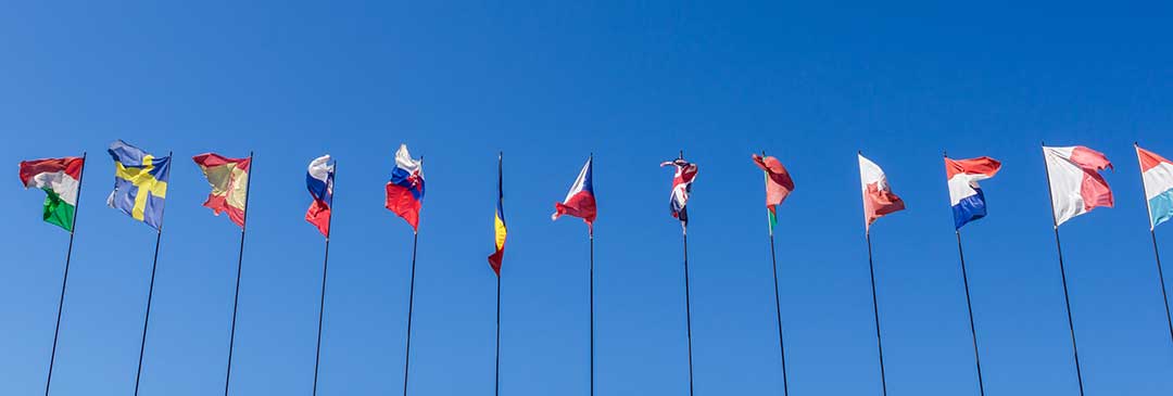 Different national flags to illustrate different national laws on succession.