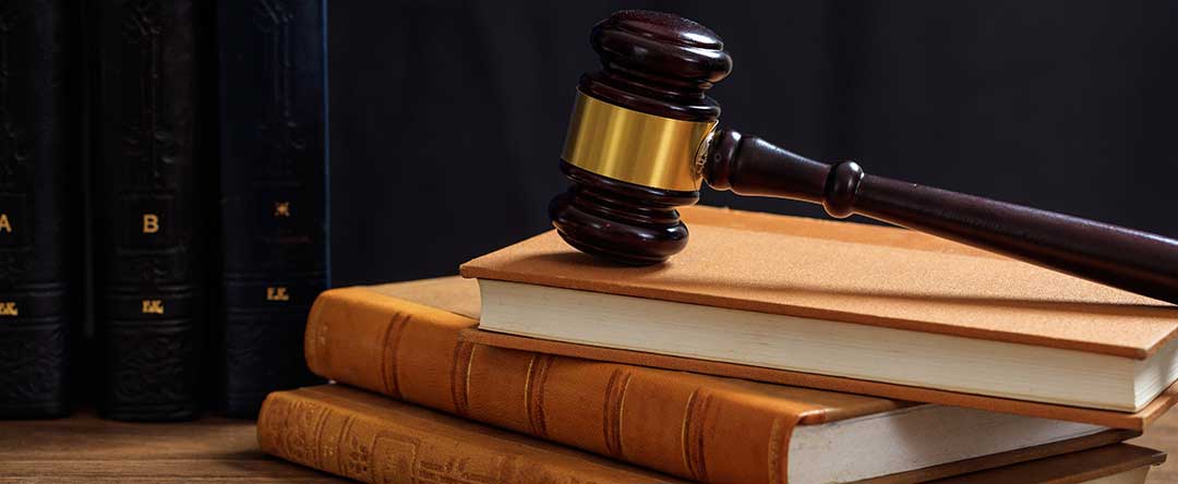 Gavel on top of law books to symbolize the court process of probate.