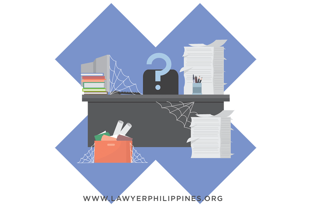 An empty office chair at a desk with piles of papers that are covered in cobwebs, indicating absenteeism at work.