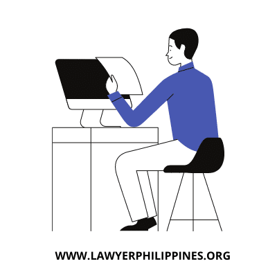 A man in front of his computer