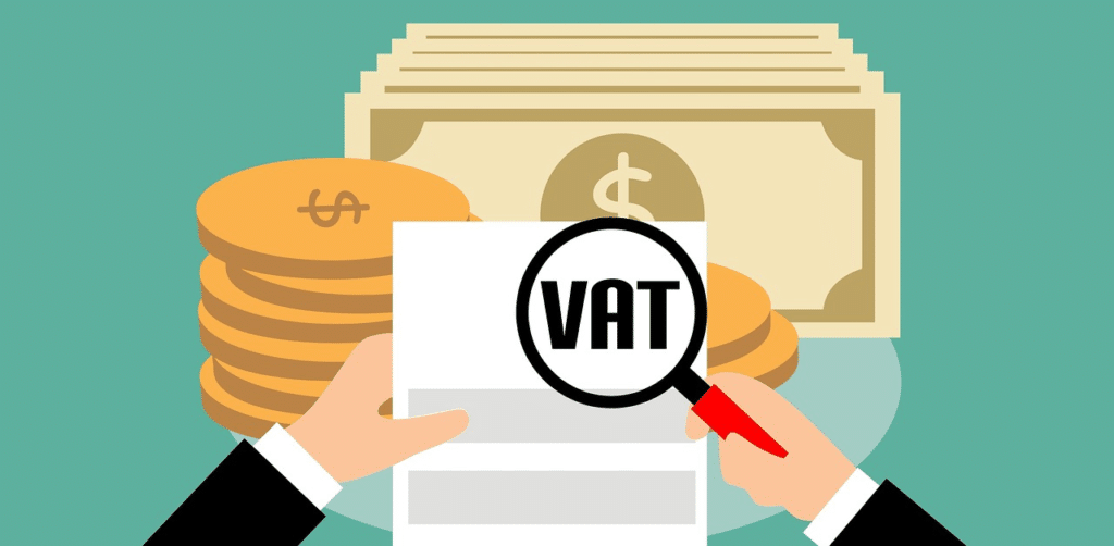 VAT paper and dollar bills and coins