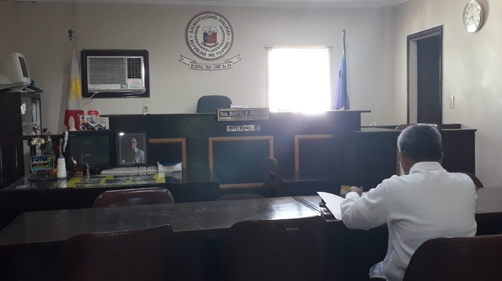 A lawyer inside a court chamber