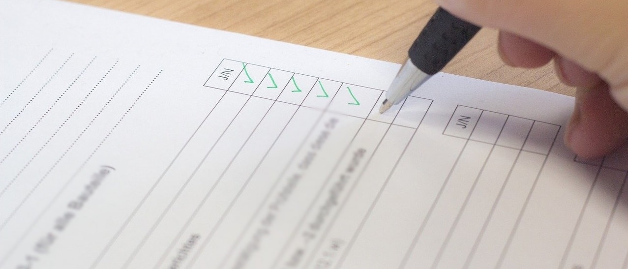 A man checking the checklist