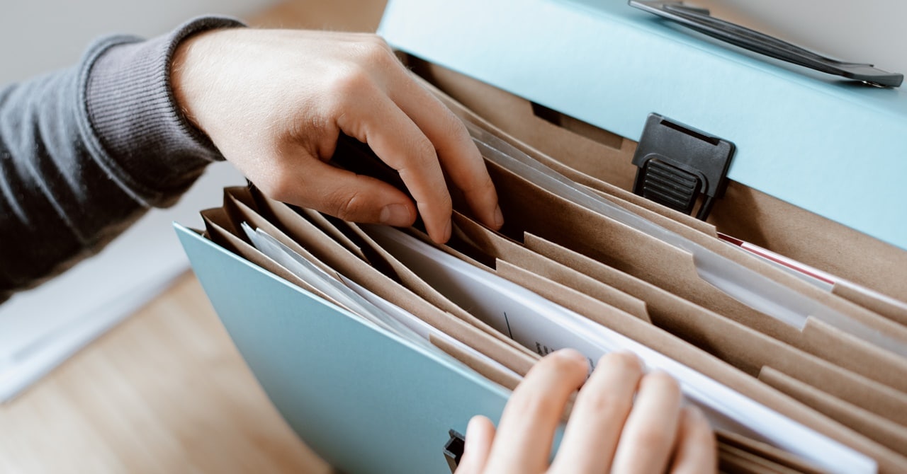 A secretary securing the documentary requirements