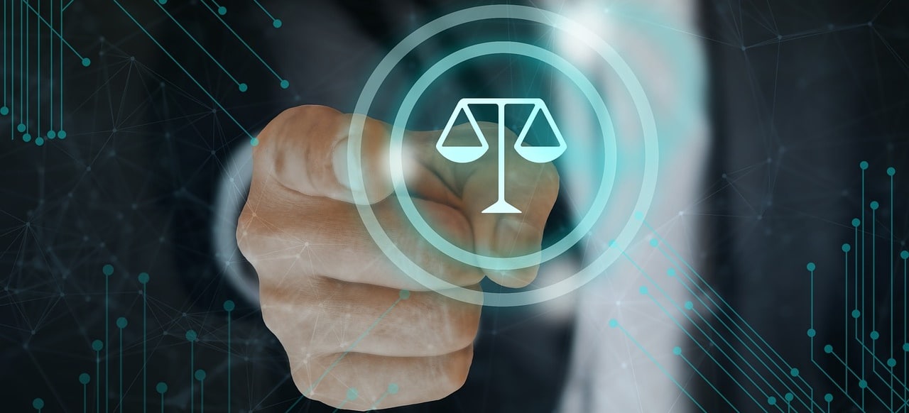 Justice logo and a pointing hand