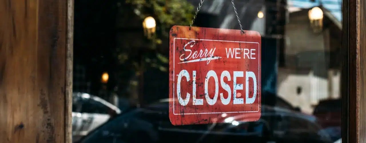 A photo of a business address that is permanently closed due to change of business address.