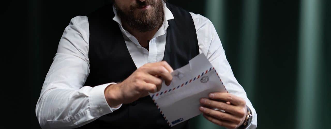 A man opening a notice for the corporate bank account in the Philippines for TITF.