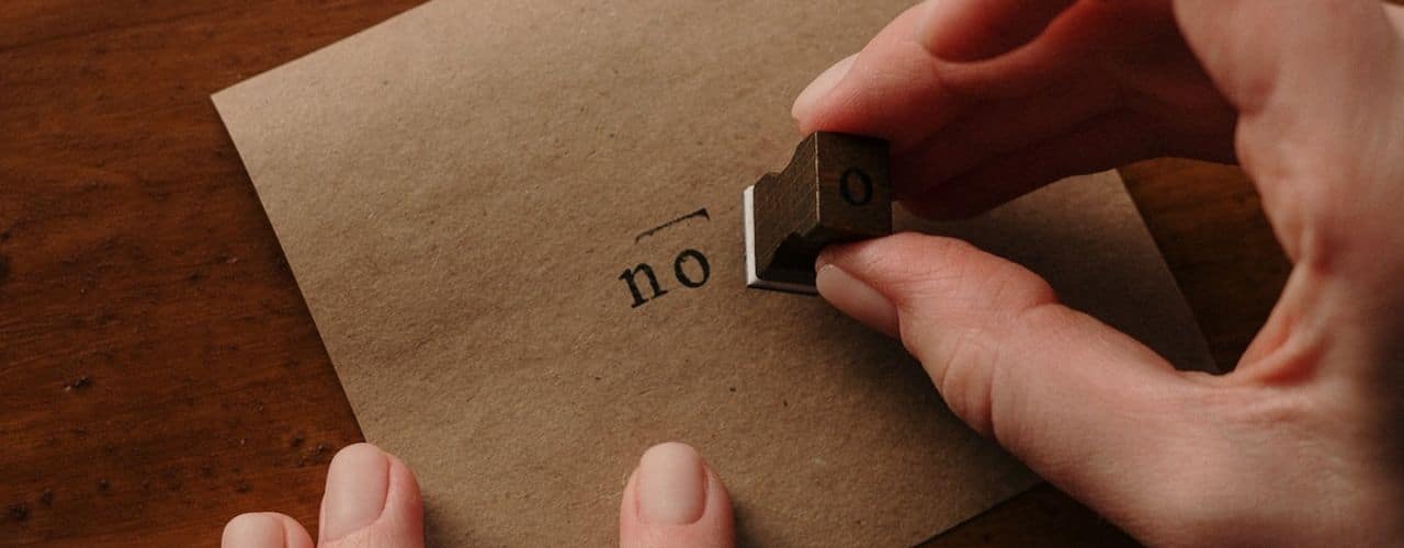 A Corporate lawyer in the Philippines stamping on a paper.