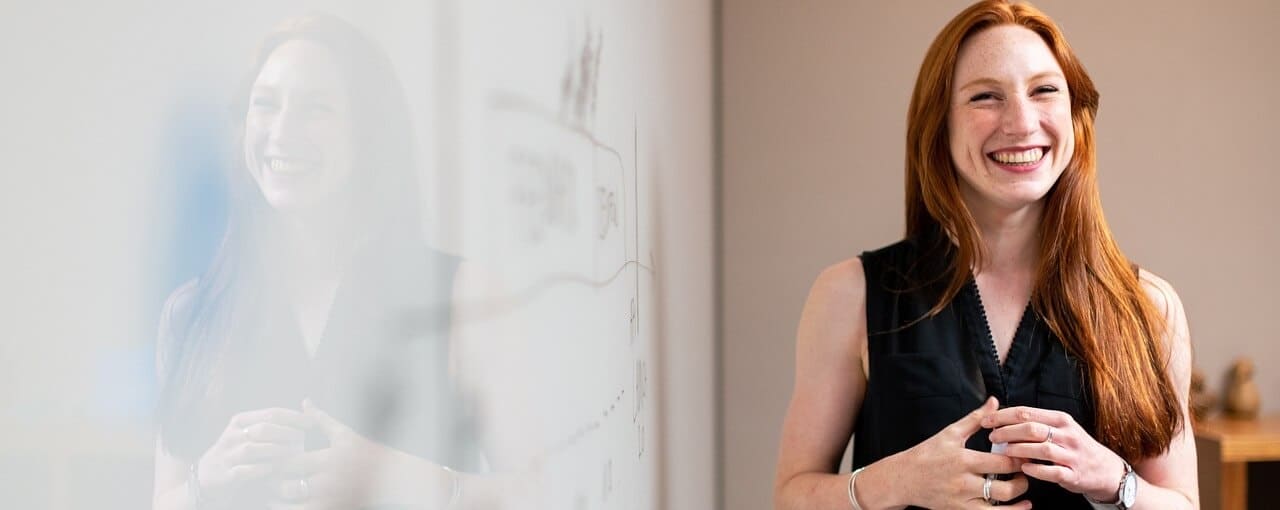 A corporate officer smiling