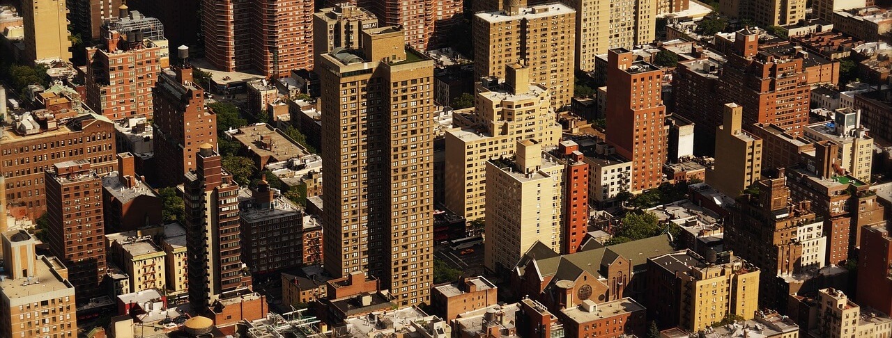 City buildings symbolizing foreign investments in the Philippines.