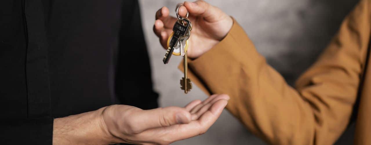 Land owner truning over the unit keys to the lessee after the renewal of Philippine Lease Agreement.