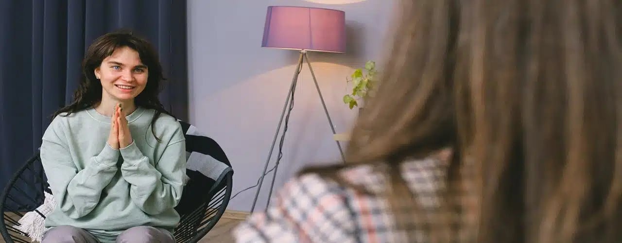 A corporate lawyer assisting a happy client in setting up a limited liability company in the Philippines