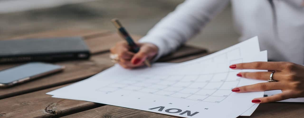 A crop photo of a woman checking if the audit process is within 180 days upon issuance of BIR LOA.