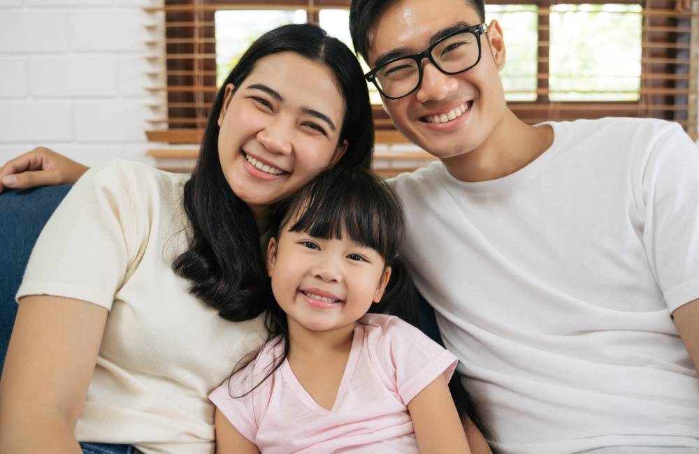A happy family showing agreement between the heirs as this is required for an Extrajudicial Settlement to proceed.