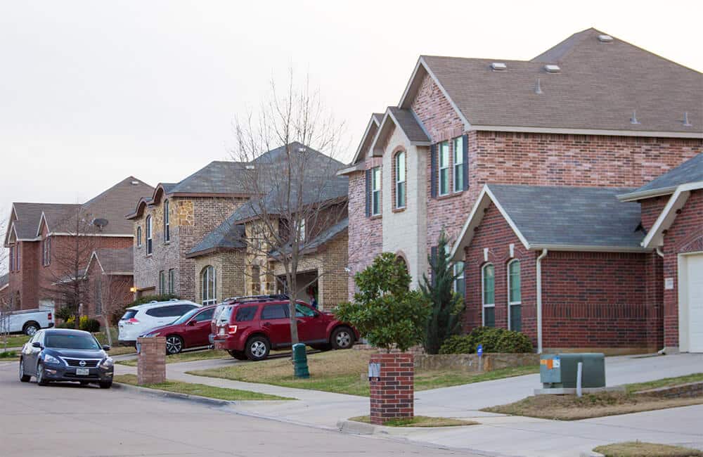 A row of houses divided as per a Will's stipulations. Wills enable you to add an heir or increase a share to an Heir under certain conditions, which FCB law will explain to you.