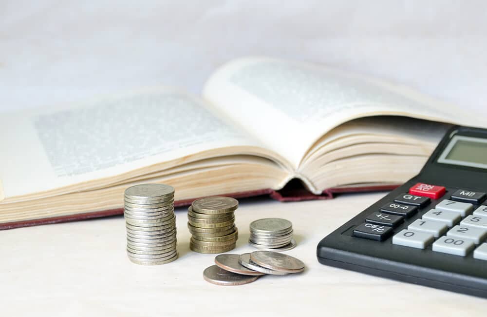 A stack of coins signifying the fees that are paid to file the case, which is about 2% of the total estate value.