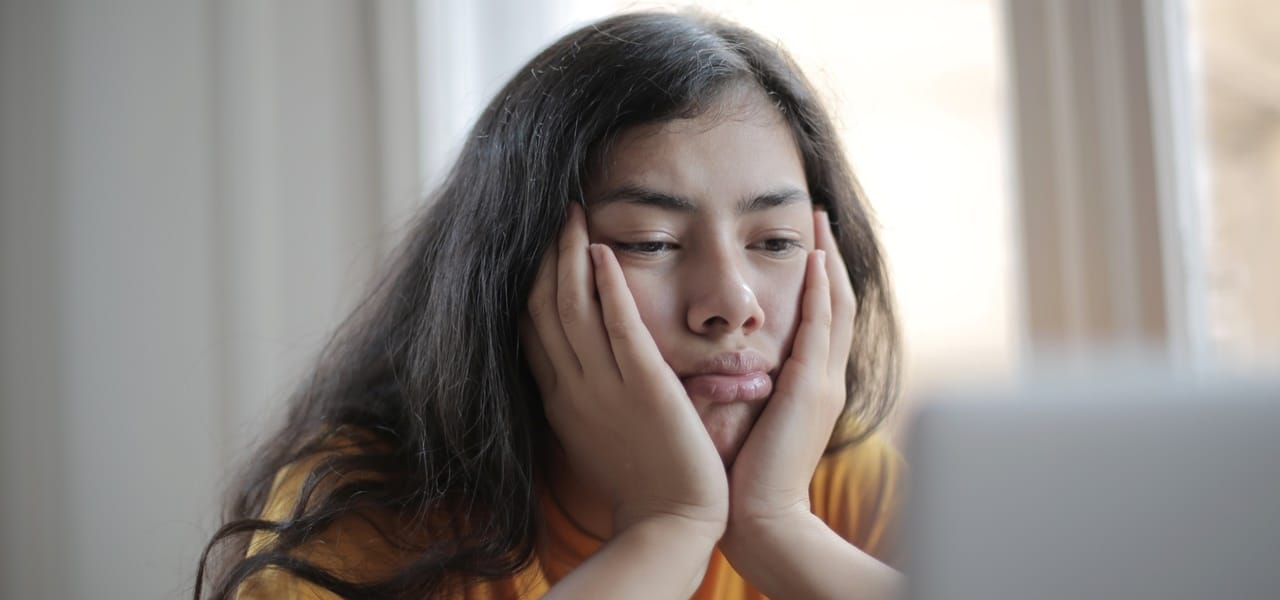 A woman doing a face palm