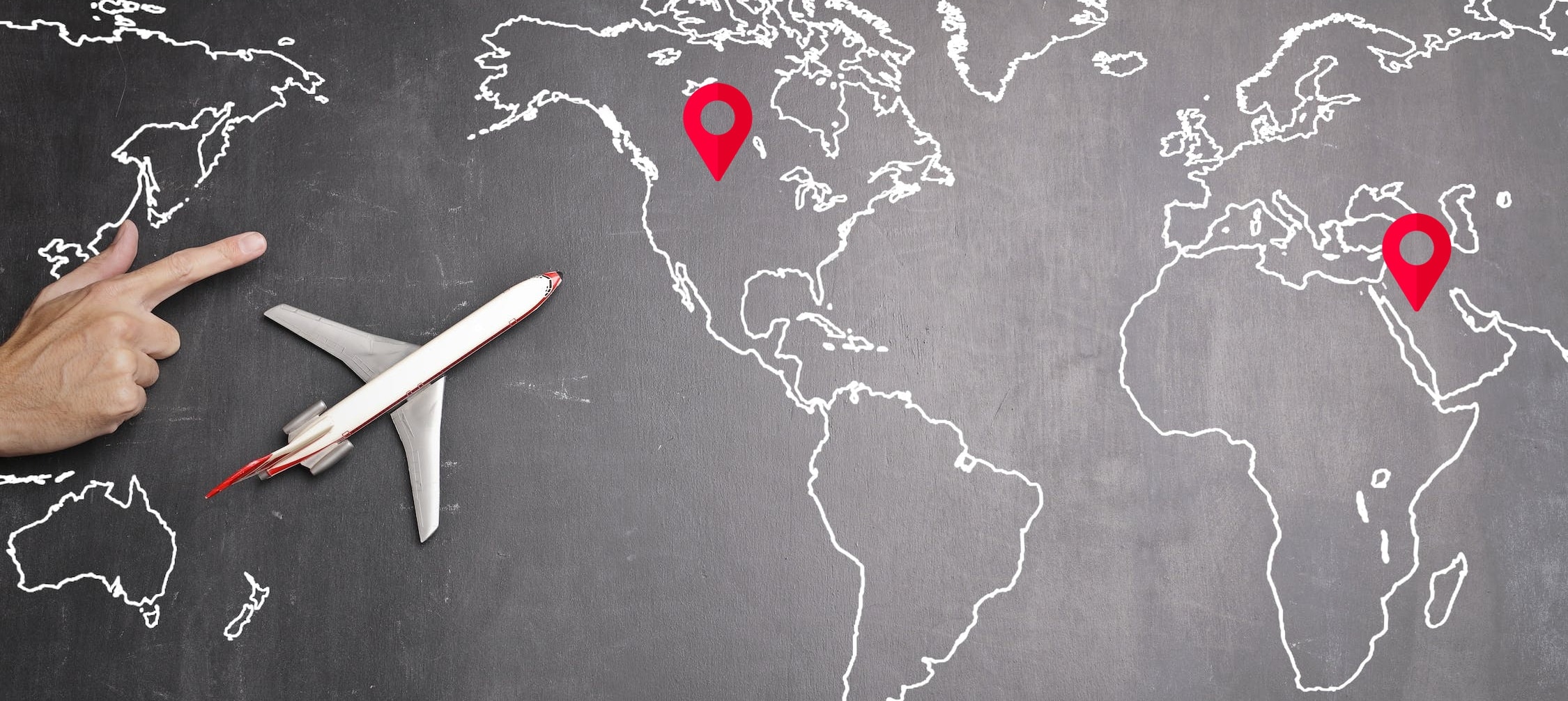 A miniature airplane on a global map with two location pins