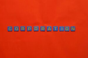 A word corporation spelled using letter tiles symbolizing limited liability company in the Philippines