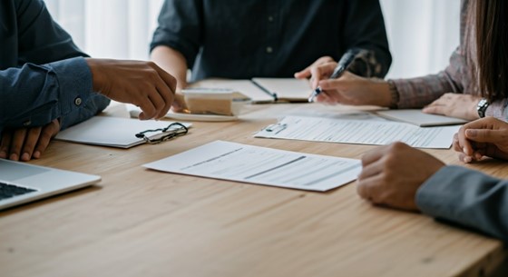 Corporate officers having a meeting about applying a SVEG Visa in the Philippines