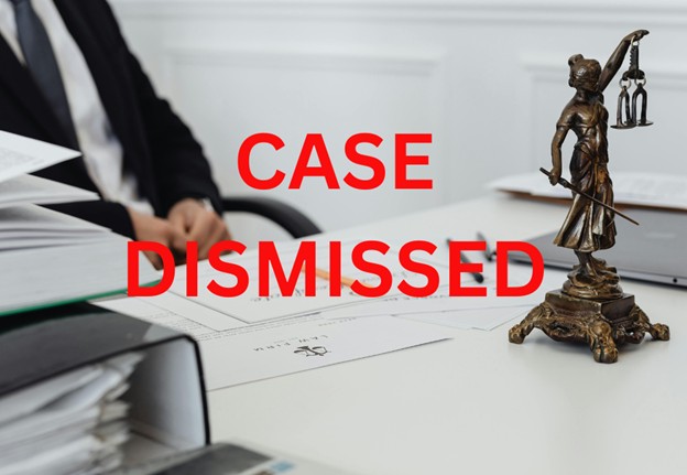 Parental Kidnapping a picture of a lawyer on his desk with red text case dismissed 9